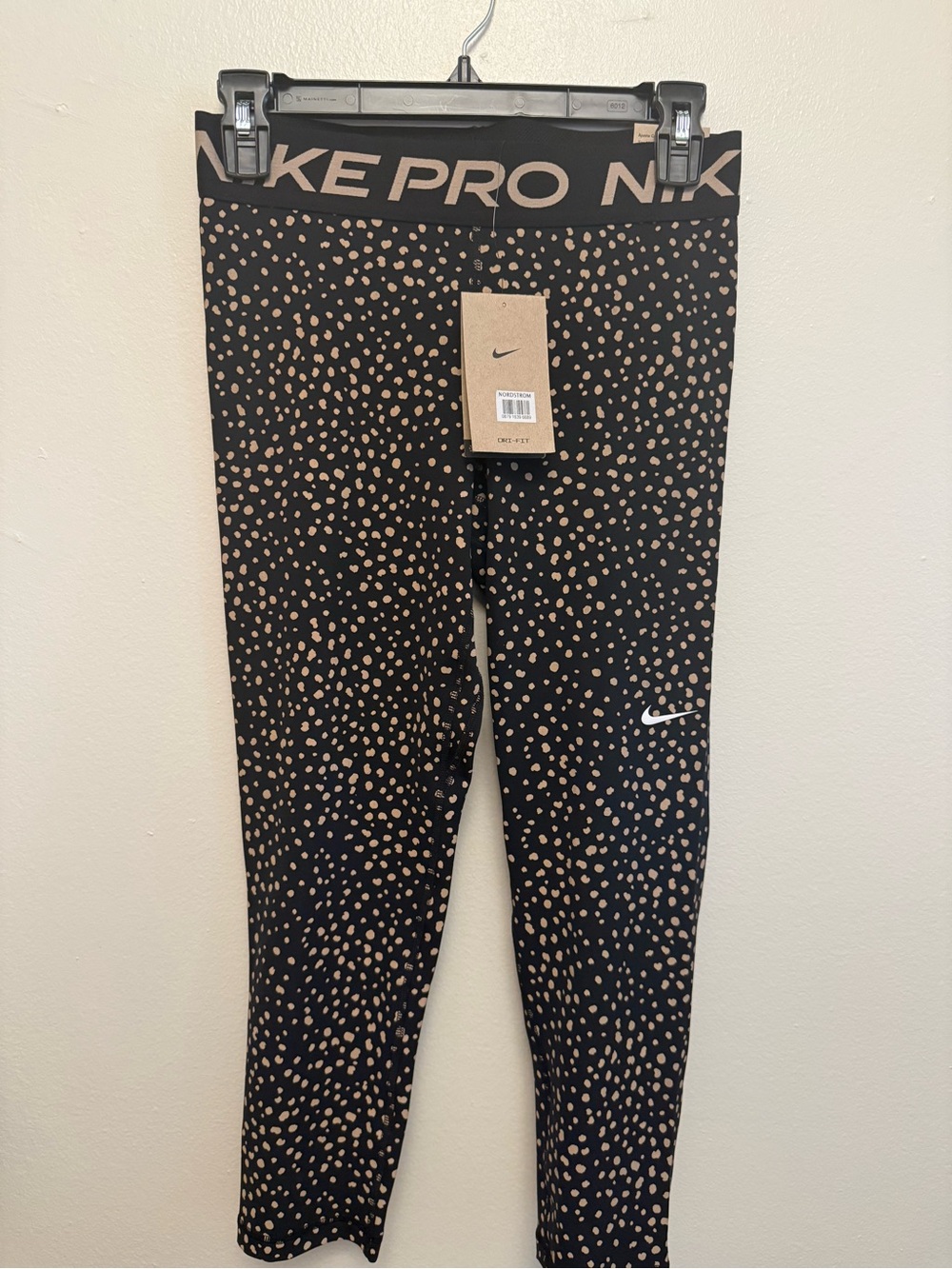 Nike Woman’s Black Leggings with Tan Spot Print